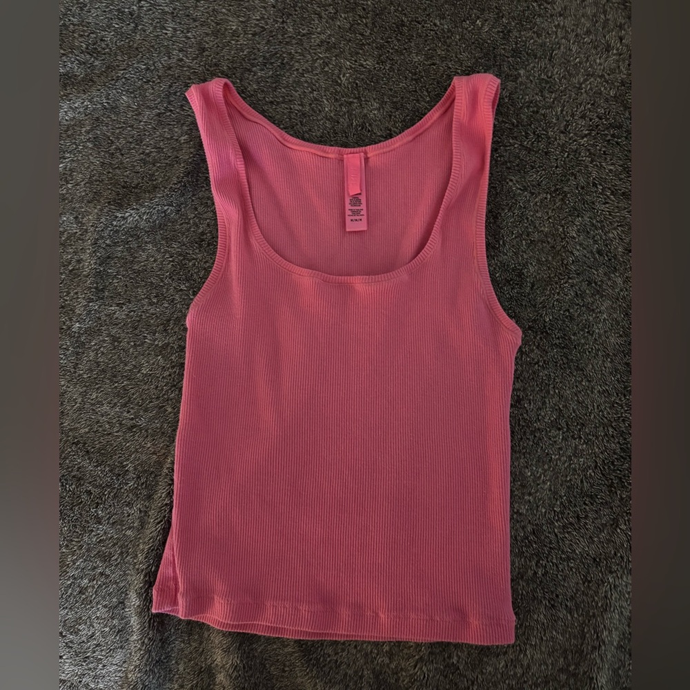 Pink skims tank